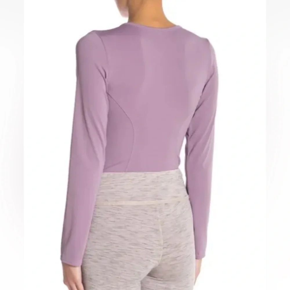 Free people intimately nylon and‎ spandex thong body suit. Retail 88